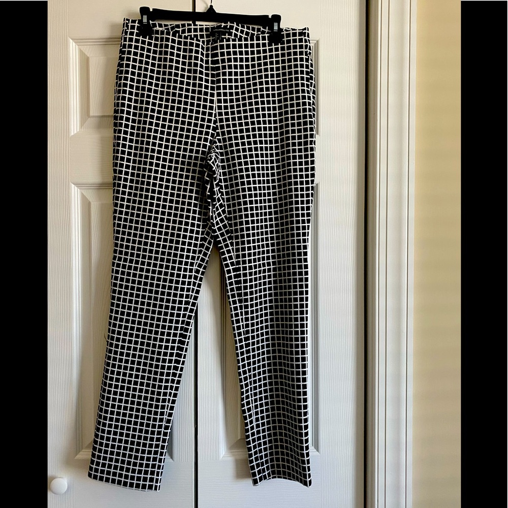 Black and white size 10 trousers, stretch material.